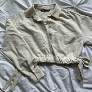 cream cinched long sleeve shirt